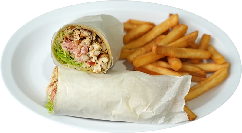 Morales Pizzeria chicken wrap cut in half with fries